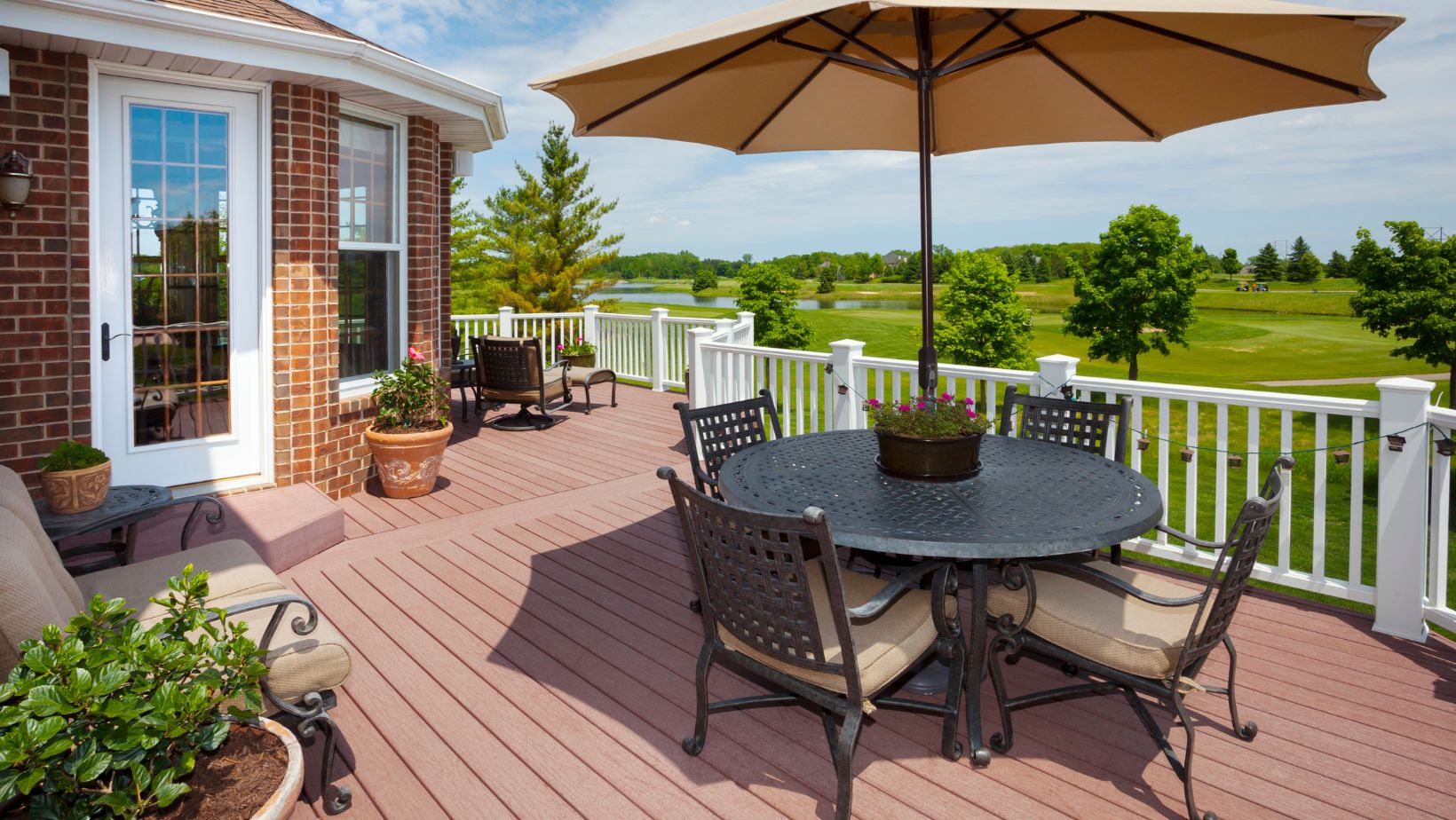 Homeowners enjoying their dream deck, a TREX Composite Deck in Orlando, FL